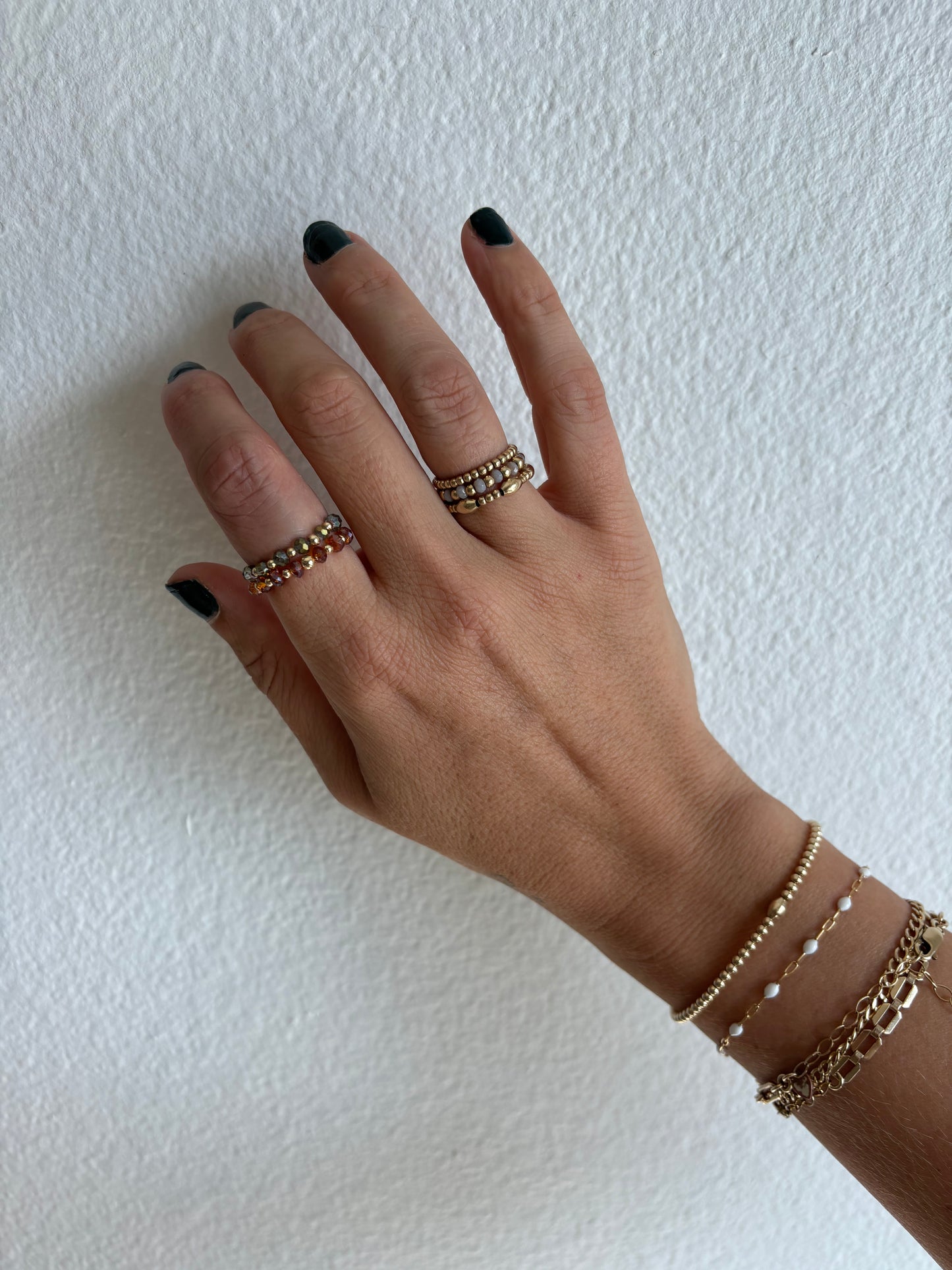 photo of hand modeling 5 rings stacked