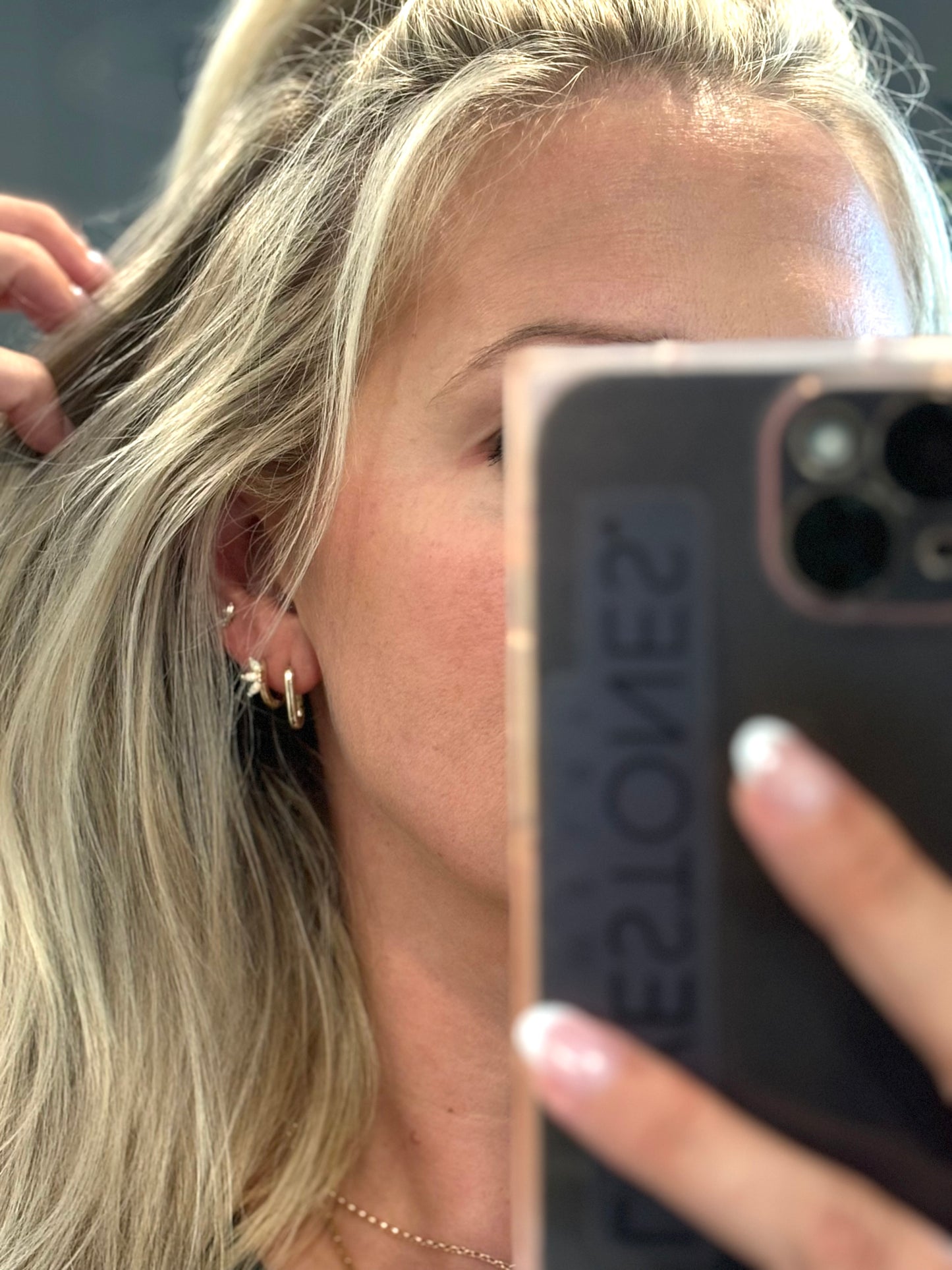 model wearing the aria marqise opal earrings