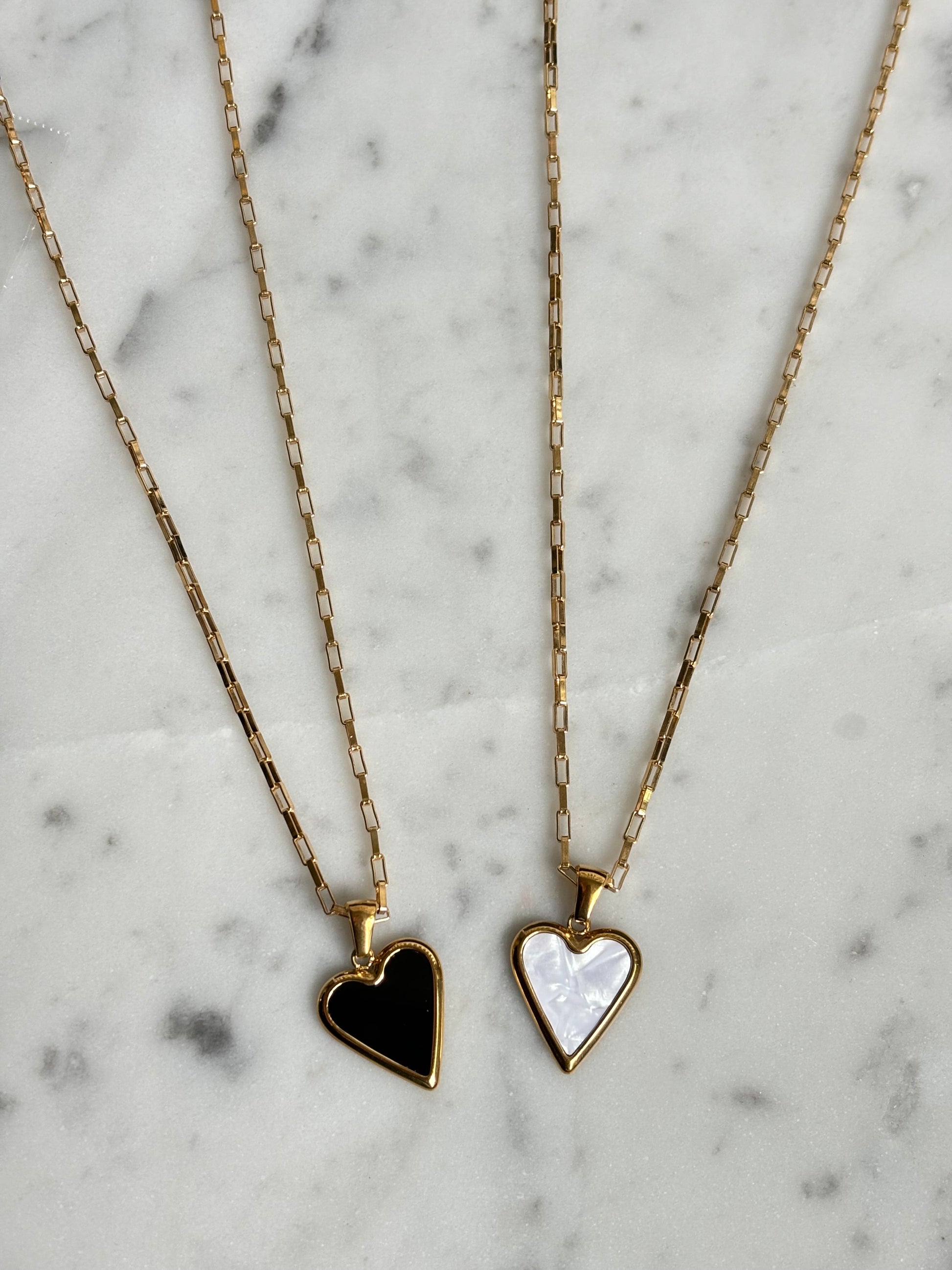 black and white heart necklaces