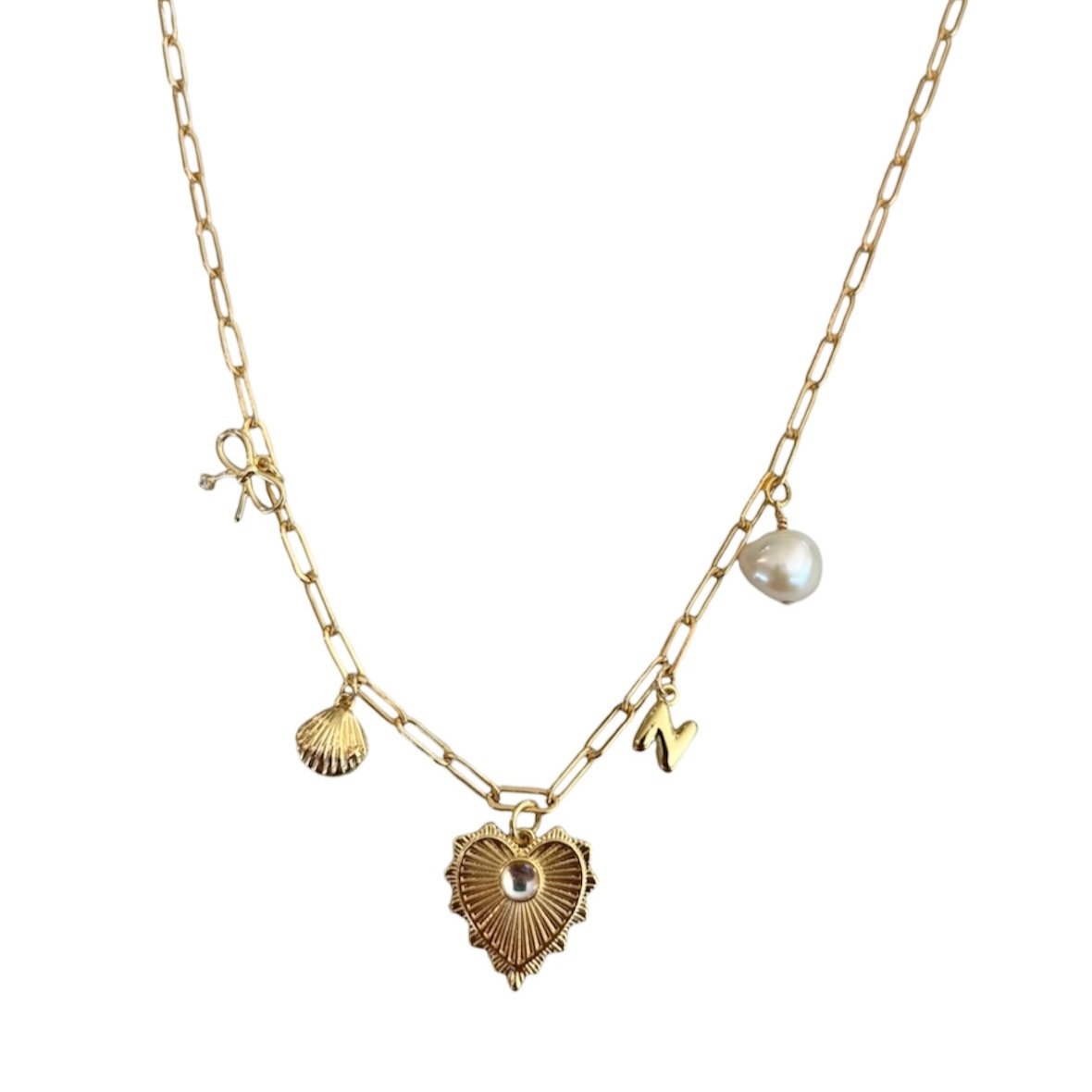 charm neckalce with bow, shell, large heart, initial, and pearl charms