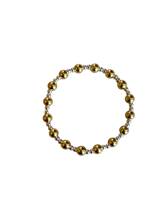 Beaded bracelet with gold and silver beads 