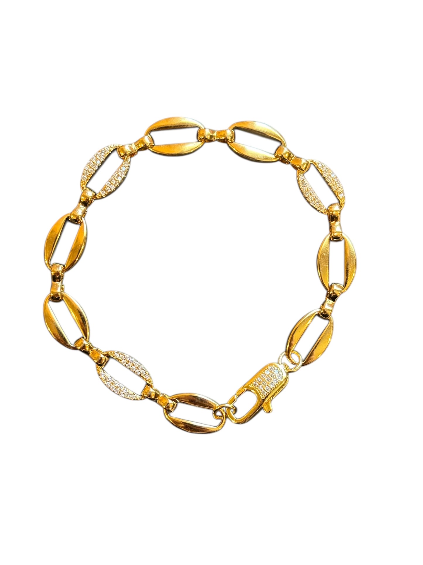 Gold bracelet with interlocking links on a white background