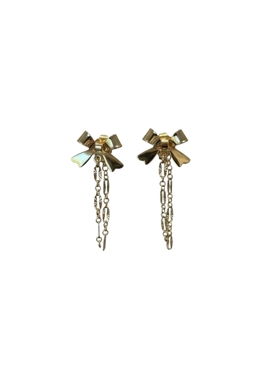 Gold bow-shaped earrings with chain details on a white background