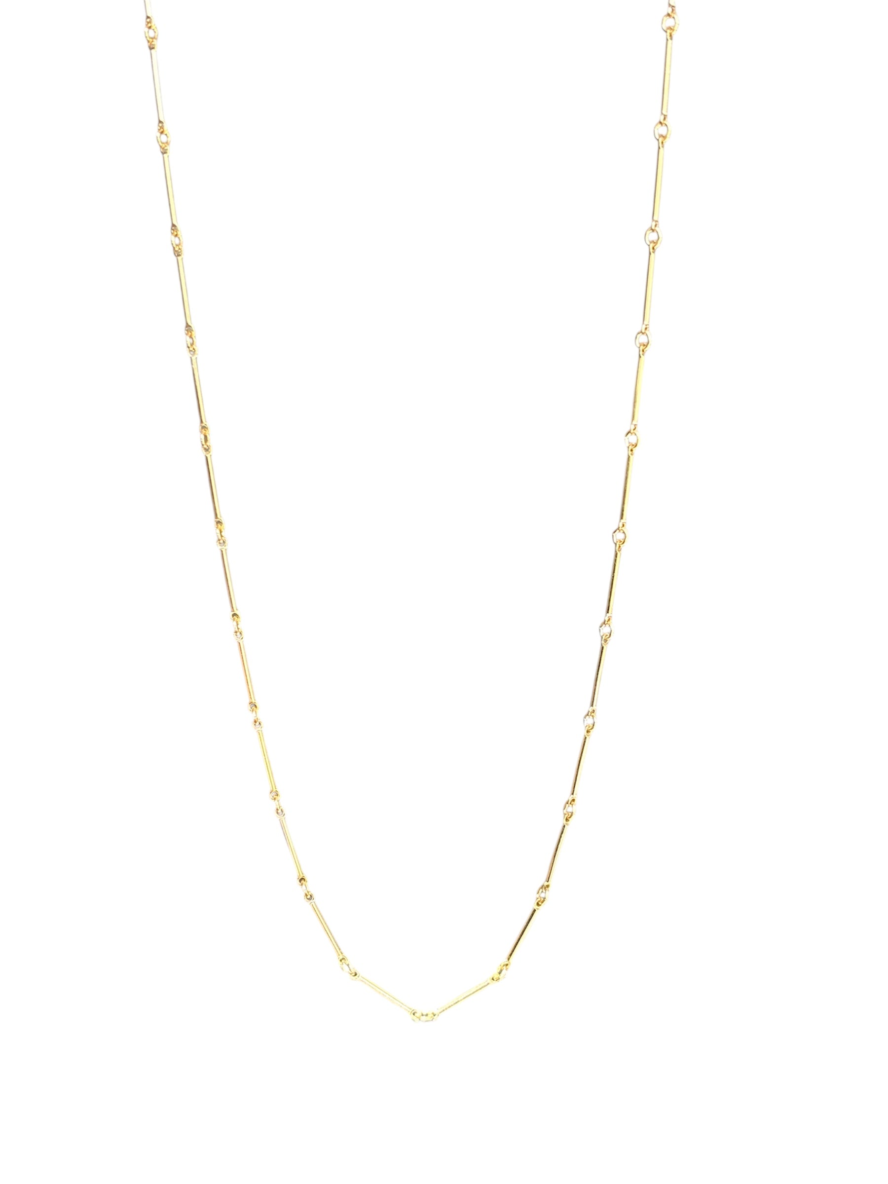 Gold filled bar necklace on a white background