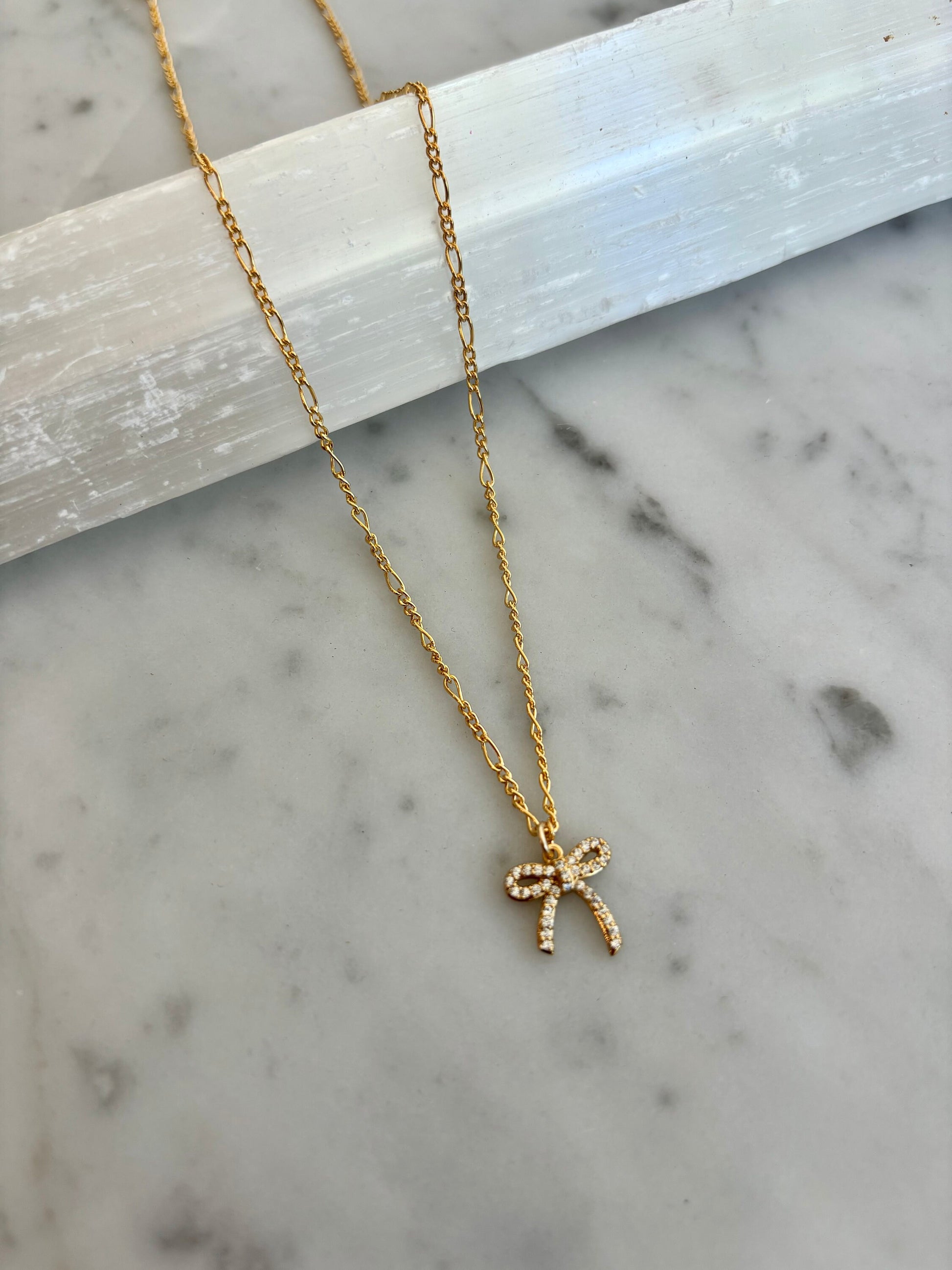 pave bow necklace flat